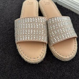 Chic Tan Slip-On Sandals with Silver Detailing
